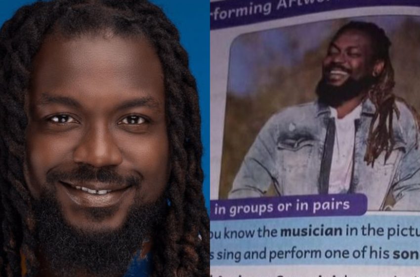  Samini Appears In Primary School Textbook – See His Reaction